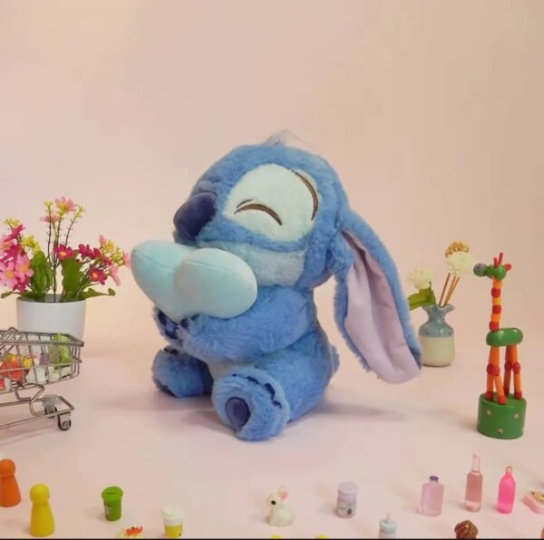 0135 - PELUCHE X "STITCH Y ANGELA" CON CORAZON (1 PZA) - Imagen 3