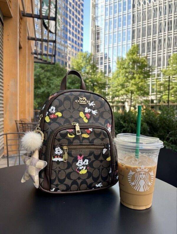 L-K279799 - MOCHILA DISEÑO PERSONAJES y CHERRY x "COACH" (1 PZA)