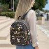 L-K279799 - MOCHILA DISEÑO PERSONAJES y CHERRY x "COACH" (1 PZA)