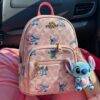 L-K279799 - MOCHILA DISEÑO PERSONAJES y CHERRY x "COACH" (1 PZA)