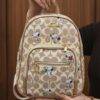 L-K279799 - MOCHILA DISEÑO PERSONAJES y CHERRY x "COACH" (1 PZA)