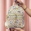 L-K279799 - MOCHILA DISEÑO PERSONAJES y CHERRY x "COACH" (1 PZA)