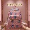 L-K279799 - MOCHILA DISEÑO PERSONAJES y CHERRY x "COACH" (1 PZA)