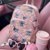 L-K279799 - MOCHILA DISEÑO PERSONAJES y CHERRY x "COACH" (1 PZA)
