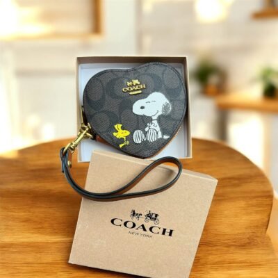 WXL-302 - MONEDERO EN FORMA DE CORAZON DE PERSONAJES x "COACH" CON CAJA (1 PZA)