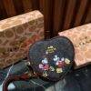 WXL-1149 - MONEDERO EN FORMA DE CORAZON DE PERSONAJES x "COACH" CON CAJA (1 PZA)