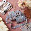 K2707 - CROSSBODY CON CARTERA DE "PERSONAJES" x "COACH" (1 PZA)