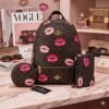 270525 - TRIO DE MOCHILA, MONEDERO y MUÑEQUERA x "COACH" (1 TRIO)