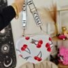 WY-0363Q - CROSSBODY EN FORMA DE CORAZON CON 3 CIERRES x "COACH" (1 PZA)