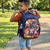 S16-2606 - TRIO ESCOLAR DE MOCHILA PARA PRIMARIA CON LUZ LED x "PERSONAJES" (1 TRIO)