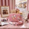 M643-31 - CROSSBODY "COACH" x "SNOOPY" (1 PZA)