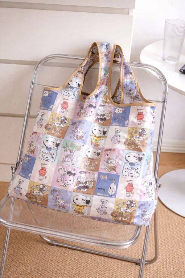 1SNB - BOLSA PLEGABLE Y REUTILIZABLE x "SNOOPY" (1 PZA)