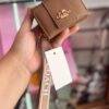 WXL-1087 - MINI MONEDERO x "COACH" POR TERCIA (3 PIEZAS)