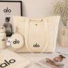 A10- TOTE BAG x "ALO" CON MONEDERO. (1 PZA)