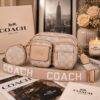 2512-9-CROSSBODY "COACH" CON MONEDERO Y BOLSILLOS DELANTEROS. (1 PZA)