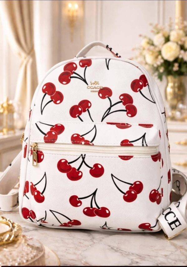 L-K279799 - MOCHILA DISEÑO PERSONAJES y CHERRY x "COACH" (1 PZA)