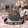 WXL-712 - CROSSBODY REDONDO CON DOBLE CIERRE x "STEVE MADDEN" (1 PZA)