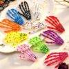 HM26L-122 - PAQUETE DE 12 PIEZAS DE PINZAS "HALLOWEEN" PARA EL CABELLO (1 DOCENA)