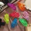 HM26L-122 - PAQUETE DE 12 PIEZAS DE PINZAS "HALLOWEEN" PARA EL CABELLO (1 DOCENA)