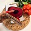 WXL-1149 - MONEDERO EN FORMA DE CORAZON DE PERSONAJES x "COACH" CON CAJA (1 PZA)