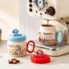 TCB189 - TAZA DE CERAMICA CON TAPA x "SNOOPY" (1 PZA)