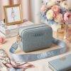WXL-827 - BANDOLERA CON DOBLE CIERRE TIPO VINIPIEL x "GUESS" (1 PZA)