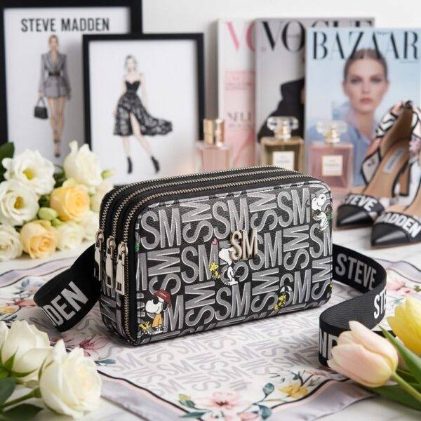 861 - CANGURERA CON 3 CIERRES DE PERSONAJES x "STEVE MADDEN" (1 PZA)