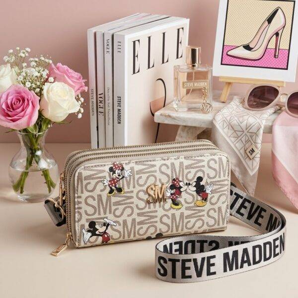 861 - CANGURERA CON 3 CIERRES DE PERSONAJES x "STEVE MADDEN" (1 PZA)